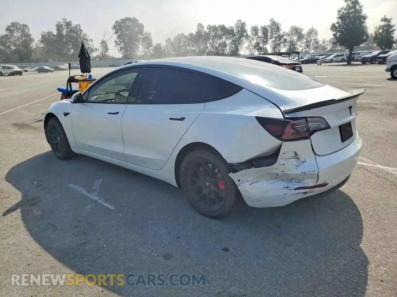 2 fotografías del automóvil dañado 5YJ3E1EAXMF982164 TESLA MODEL 3 2021