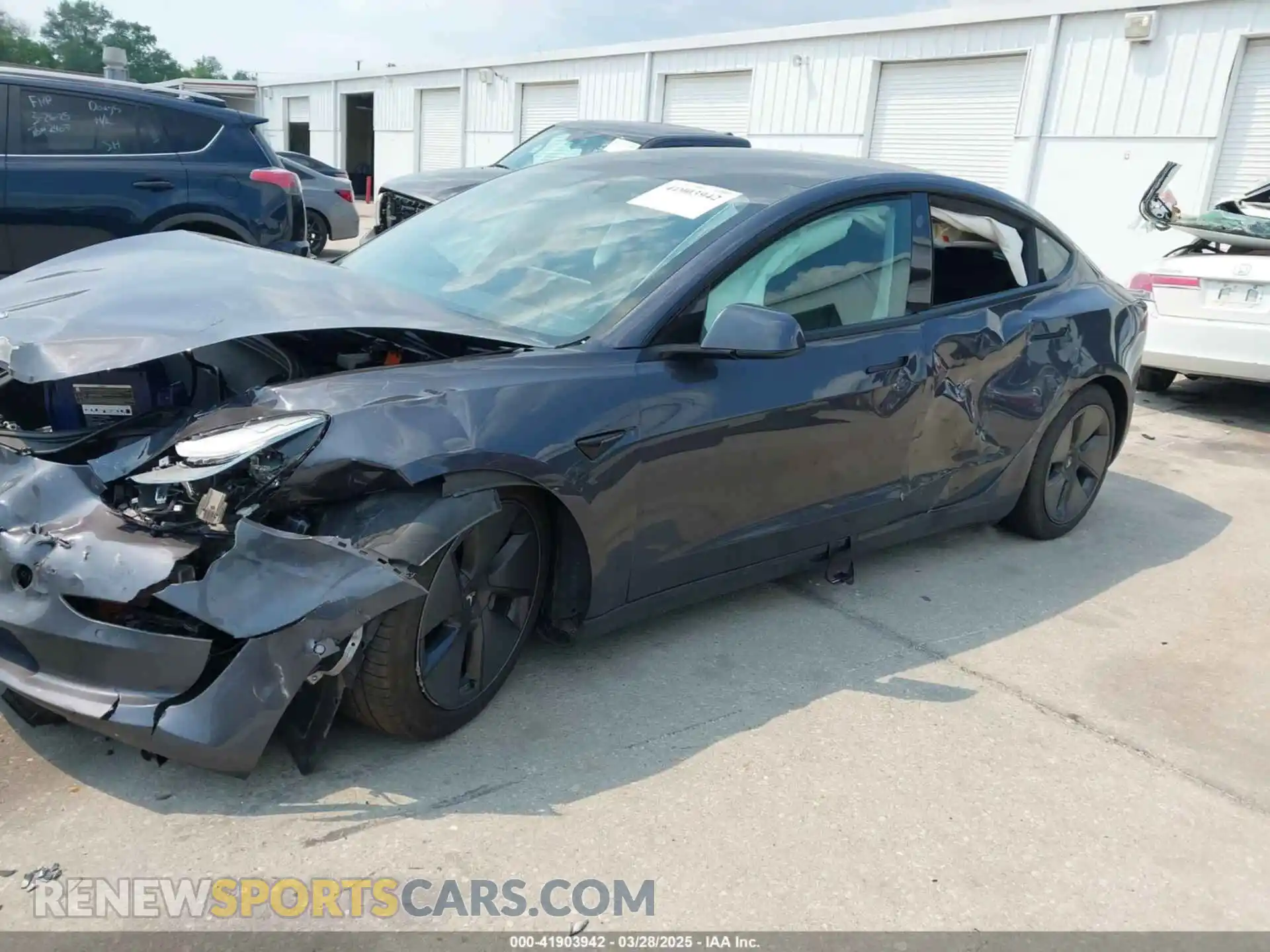 2 Photograph of a damaged car 5YJ3E1EAXMF991463 TESLA MODEL 3 2021