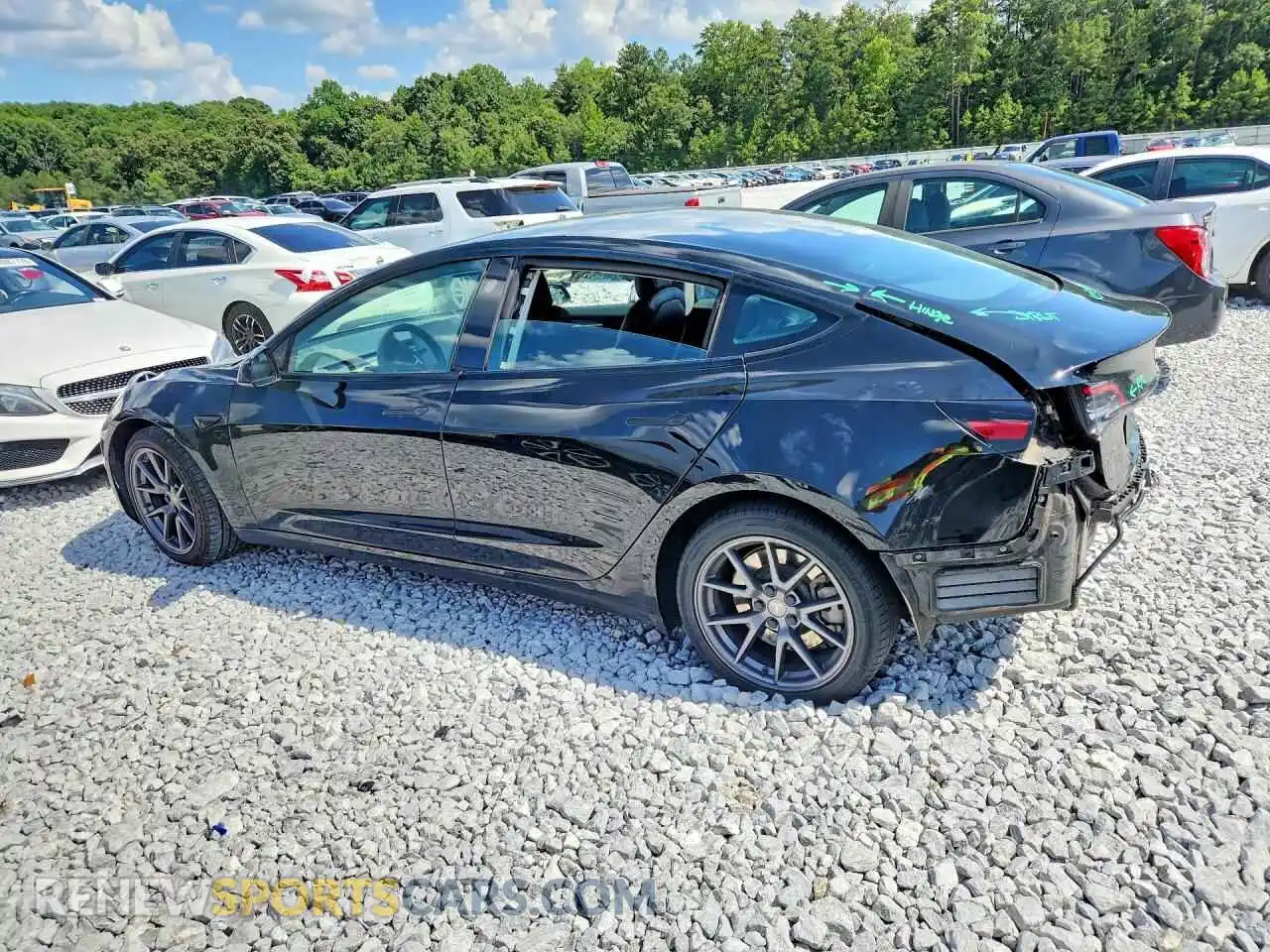 2 Photograph of a damaged car 5YJ3E1EB0MF035613 TESLA MODEL 3 2021