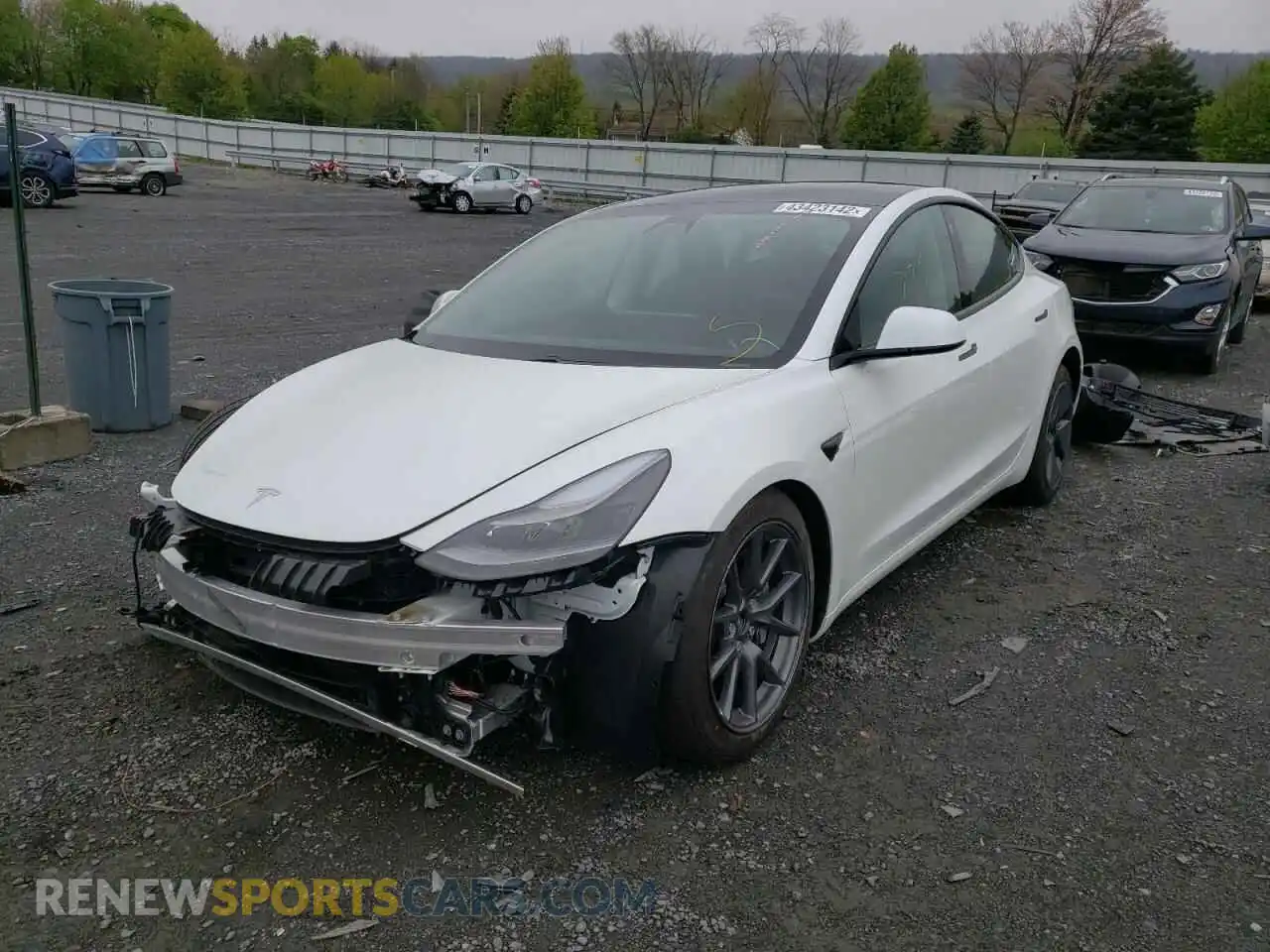 2 Photograph of a damaged car 5YJ3E1EB0MF063248 TESLA MODEL 3 2021