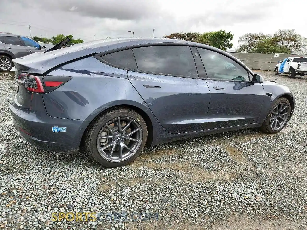 3 Photograph of a damaged car 5YJ3E1EB0MF879621 TESLA MODEL 3 2021