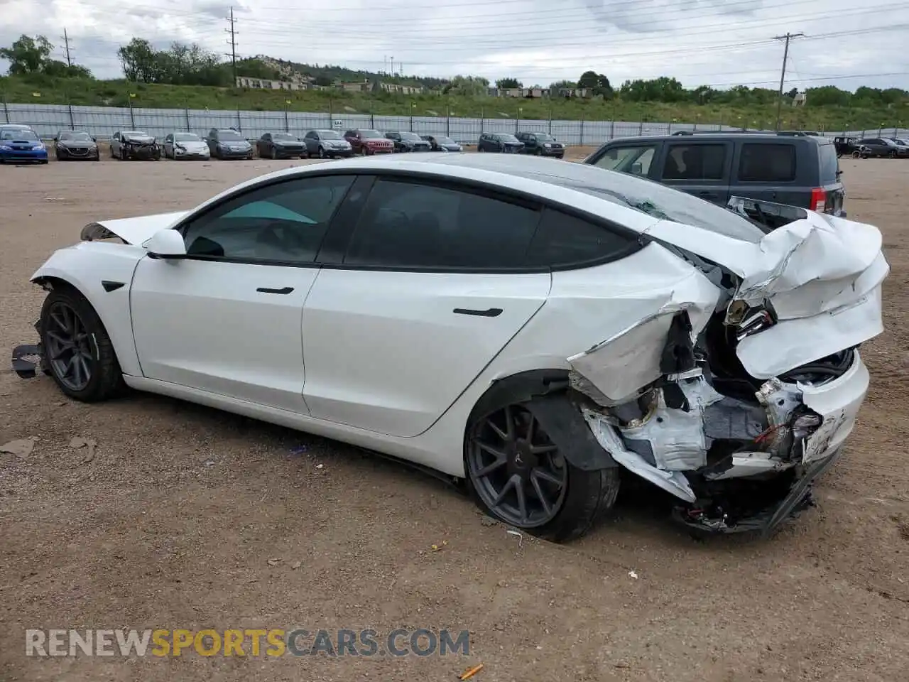 2 Photograph of a damaged car 5YJ3E1EB0MF915484 TESLA MODEL 3 2021
