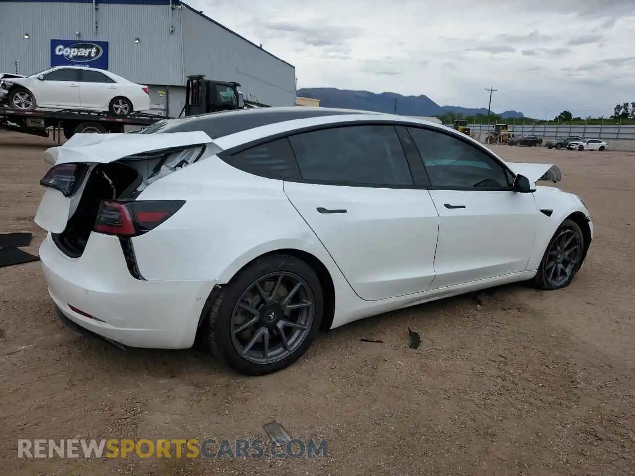 3 Photograph of a damaged car 5YJ3E1EB0MF915484 TESLA MODEL 3 2021