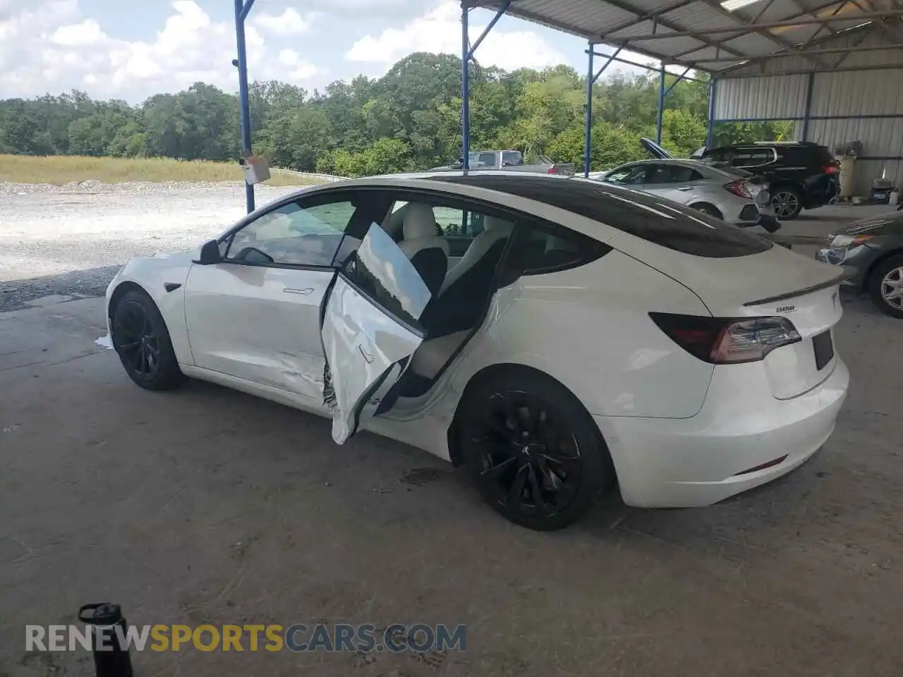 2 Photograph of a damaged car 5YJ3E1EB0MF916098 TESLA MODEL 3 2021