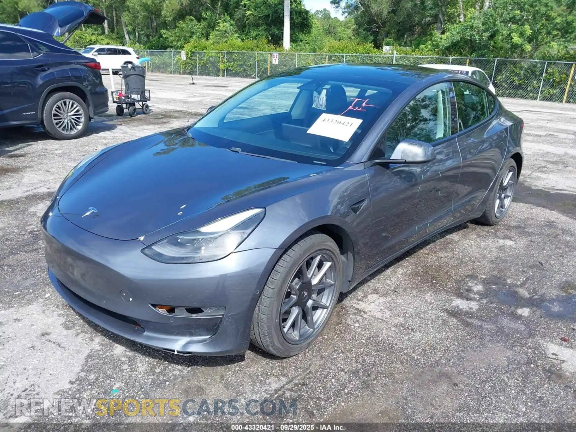2 Photograph of a damaged car 5YJ3E1EB0MF924623 TESLA MODEL 3 2021