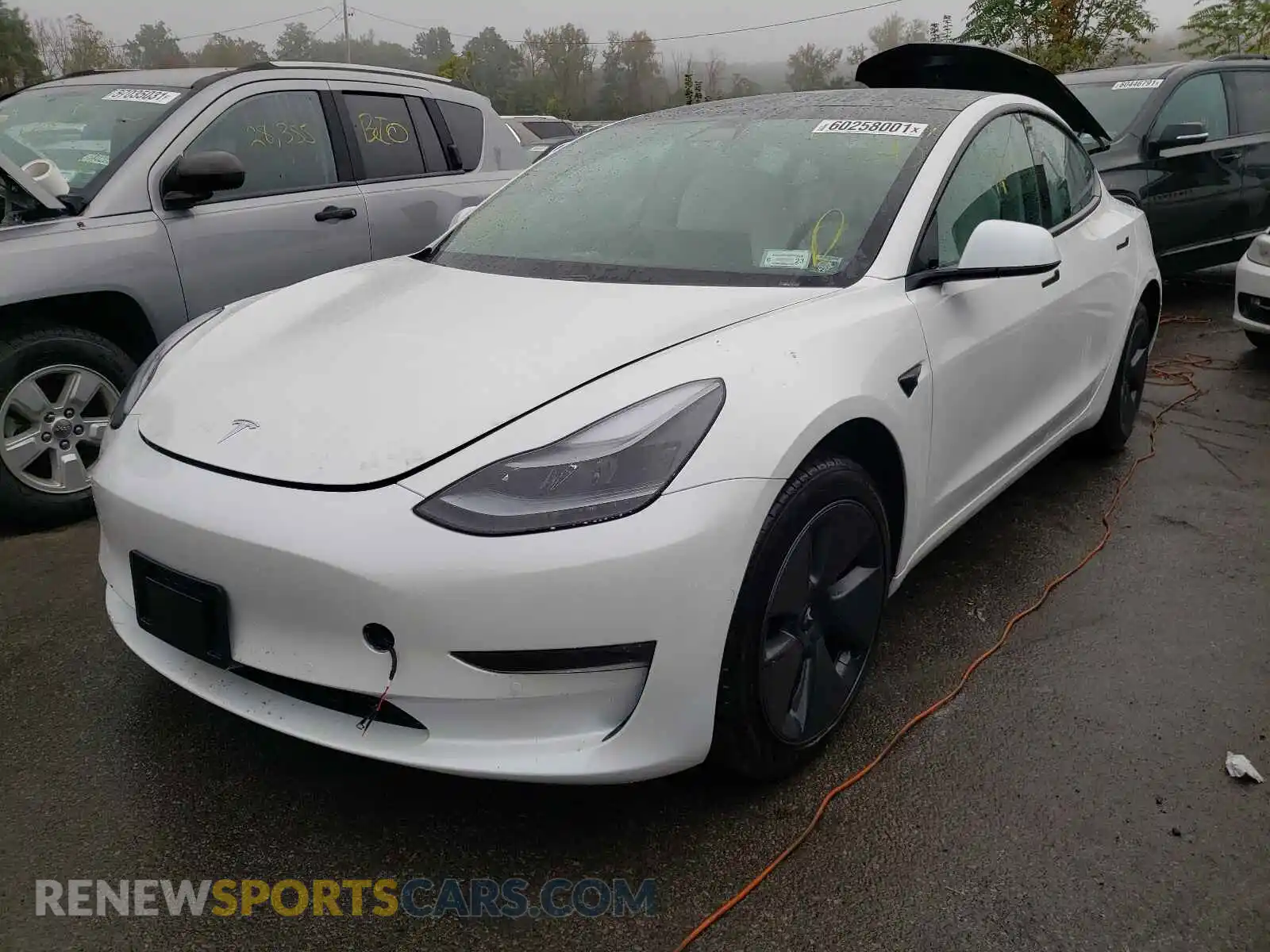 2 Photograph of a damaged car 5YJ3E1EB0MF981498 TESLA MODEL 3 2021