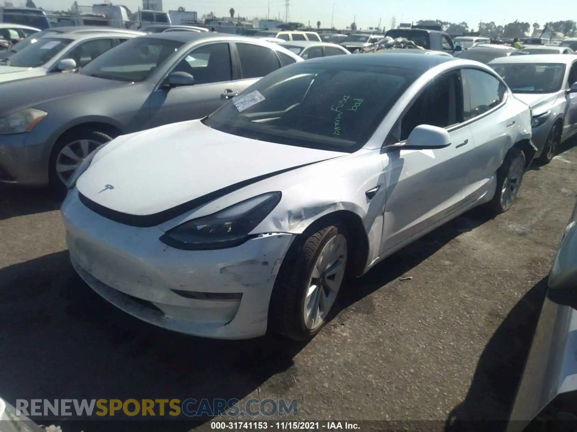 2 Photograph of a damaged car 5YJ3E1EB0MF990525 TESLA MODEL 3 2021