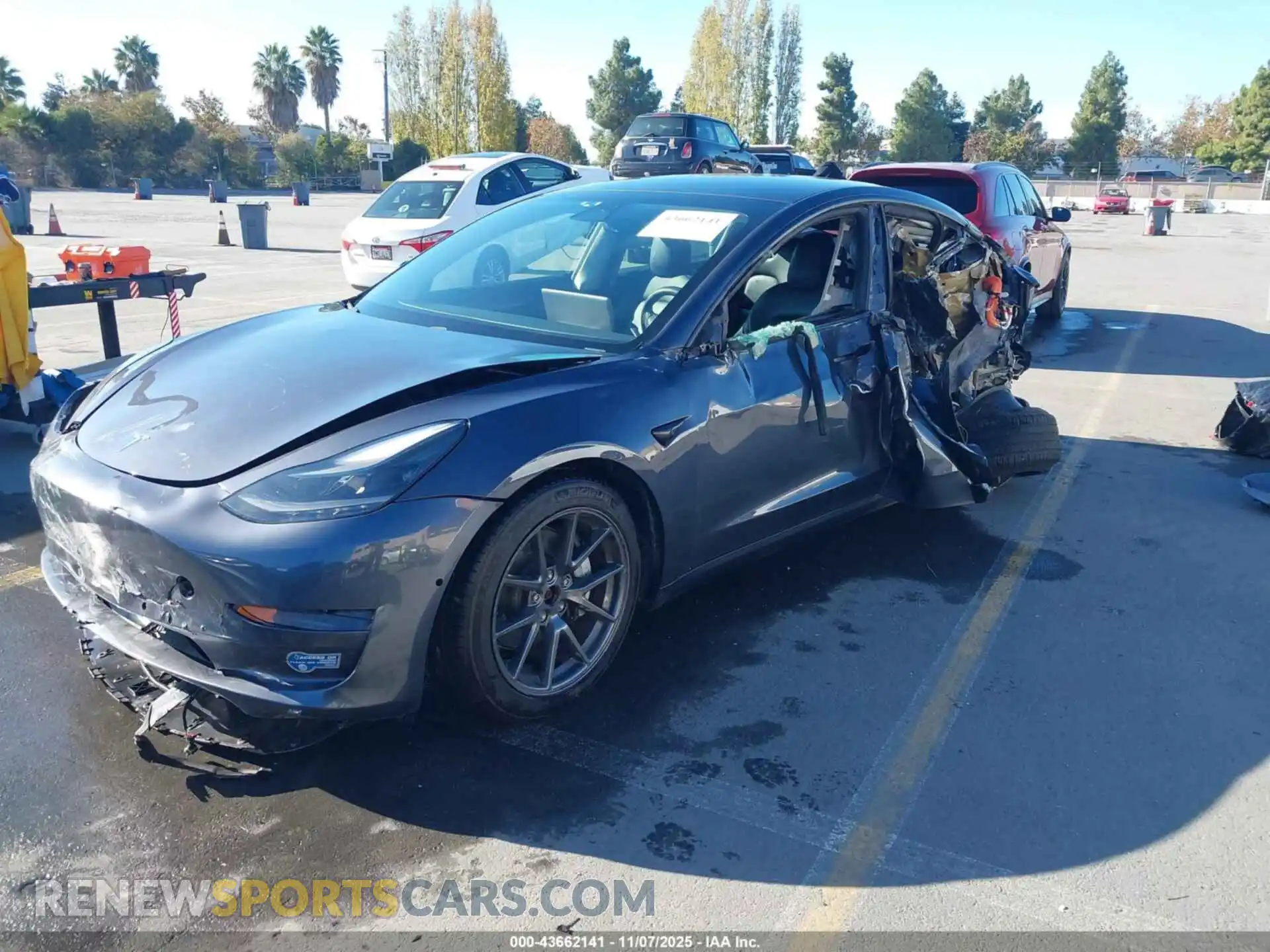 2 Photograph of a damaged car 5YJ3E1EB0MF999077 TESLA MODEL 3 2021