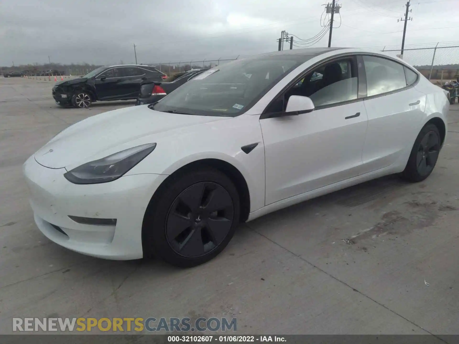 2 fotografías del automóvil dañado 5YJ3E1EB1MF019677 TESLA MODEL 3 2021