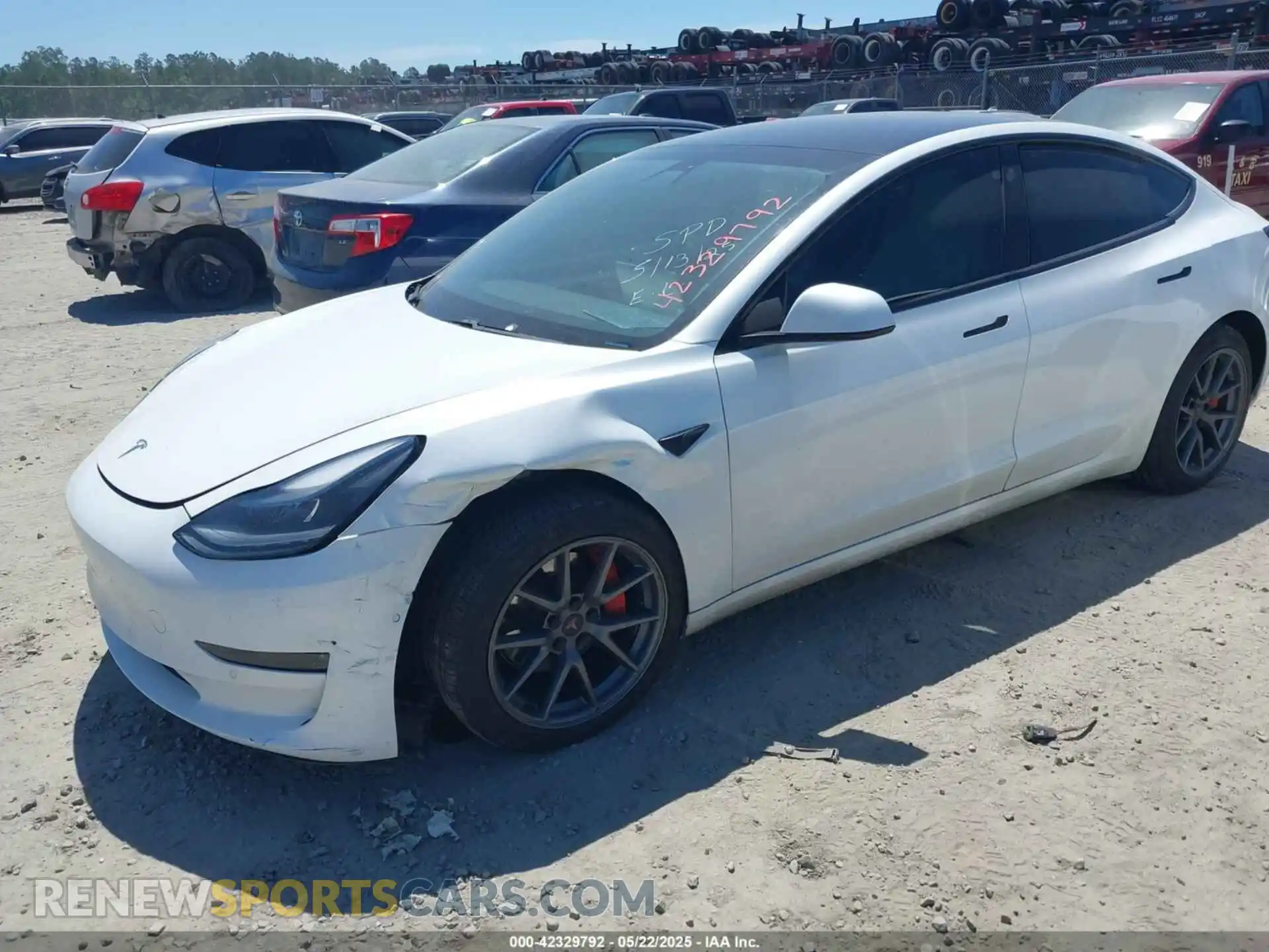 2 Photograph of a damaged car 5YJ3E1EB1MF062710 TESLA MODEL 3 2021
