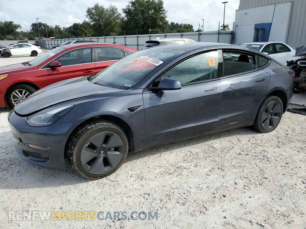 1 Photograph of a damaged car 5YJ3E1EB1MF869423 TESLA MODEL 3 2021