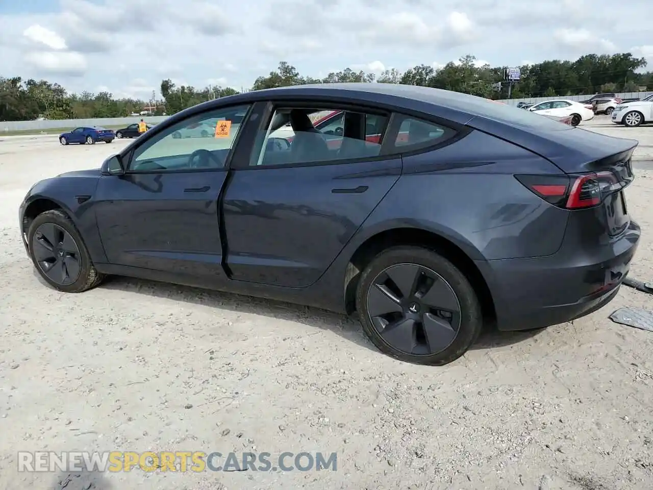 2 Photograph of a damaged car 5YJ3E1EB1MF869423 TESLA MODEL 3 2021
