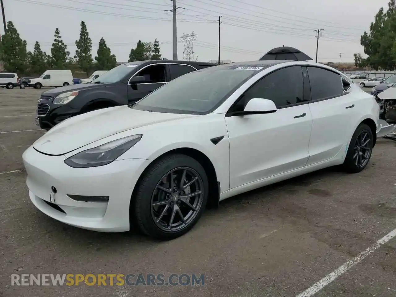 1 Photograph of a damaged car 5YJ3E1EB1MF928471 TESLA MODEL 3 2021