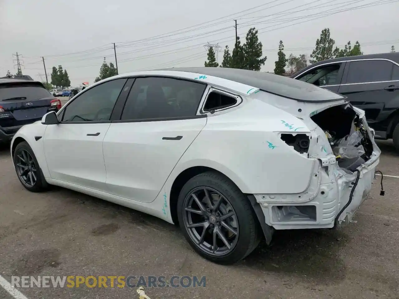 2 Photograph of a damaged car 5YJ3E1EB1MF928471 TESLA MODEL 3 2021