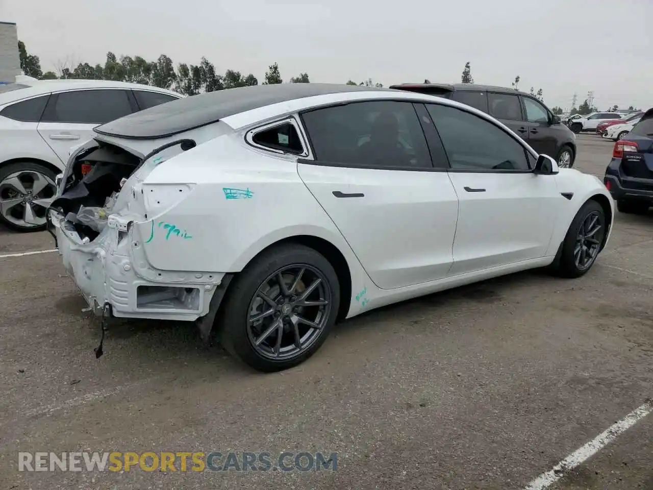 3 Photograph of a damaged car 5YJ3E1EB1MF928471 TESLA MODEL 3 2021