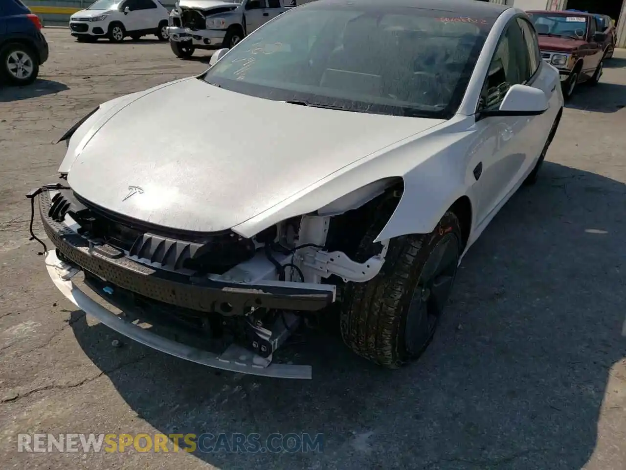 2 Photograph of a damaged car 5YJ3E1EB1MF979128 TESLA MODEL 3 2021