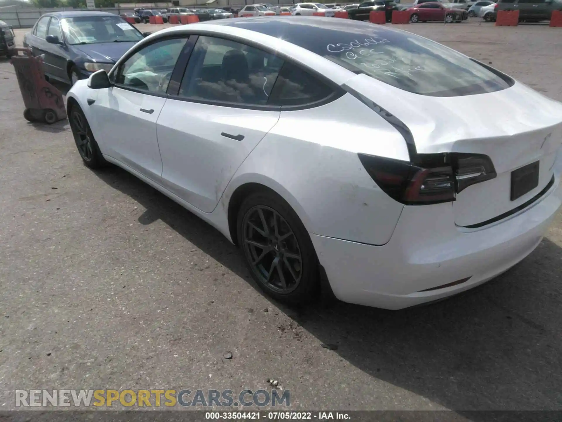 3 Photograph of a damaged car 5YJ3E1EB1MF979386 TESLA MODEL 3 2021