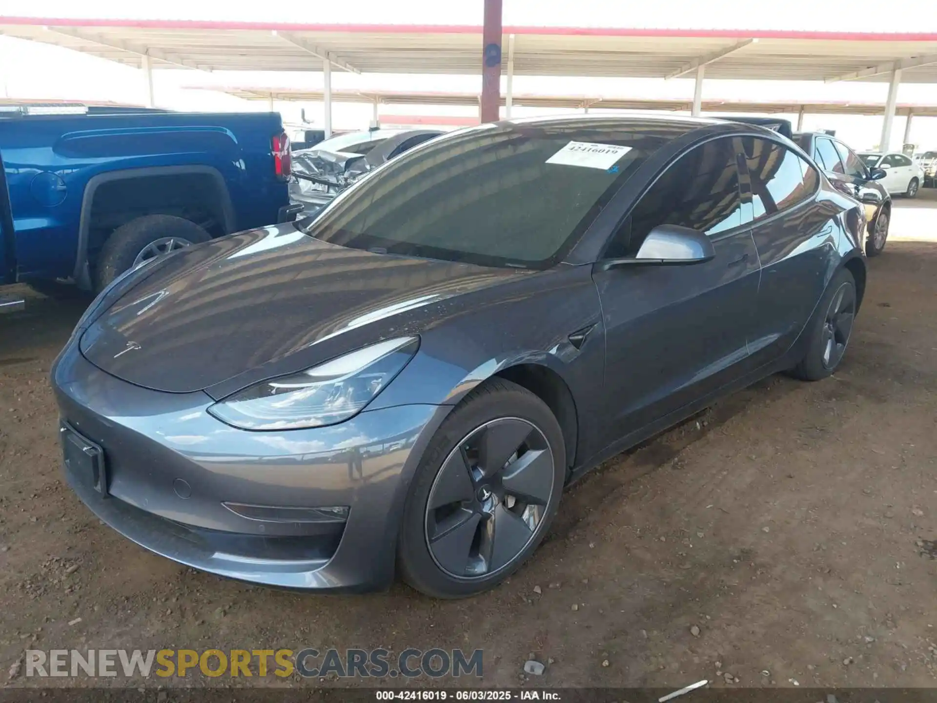 2 Photograph of a damaged car 5YJ3E1EB1MF979663 TESLA MODEL 3 2021