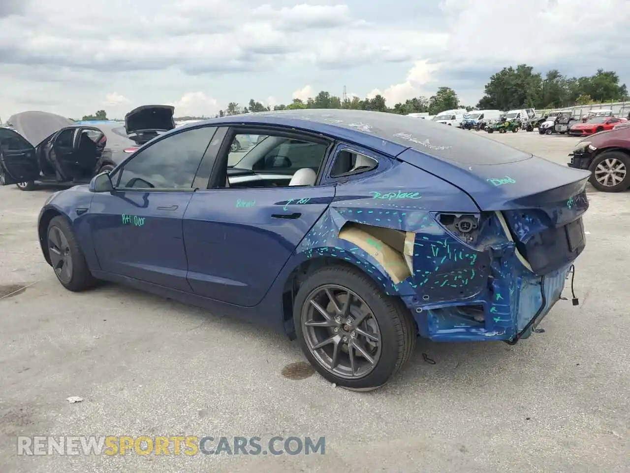 2 Photograph of a damaged car 5YJ3E1EB1MF980599 TESLA MODEL 3 2021