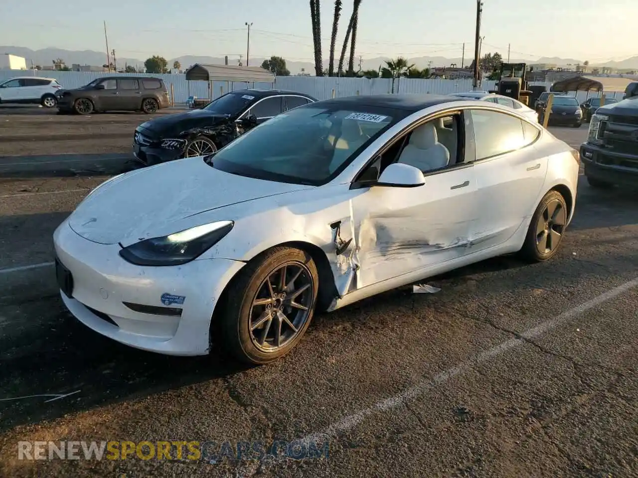 1 Photograph of a damaged car 5YJ3E1EB1MF999914 TESLA MODEL 3 2021