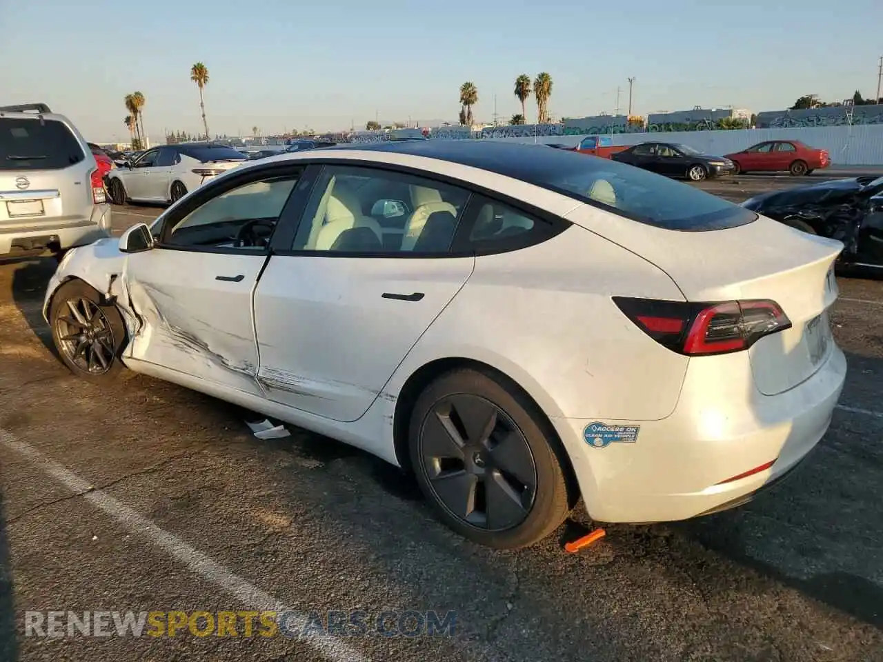 2 Photograph of a damaged car 5YJ3E1EB1MF999914 TESLA MODEL 3 2021