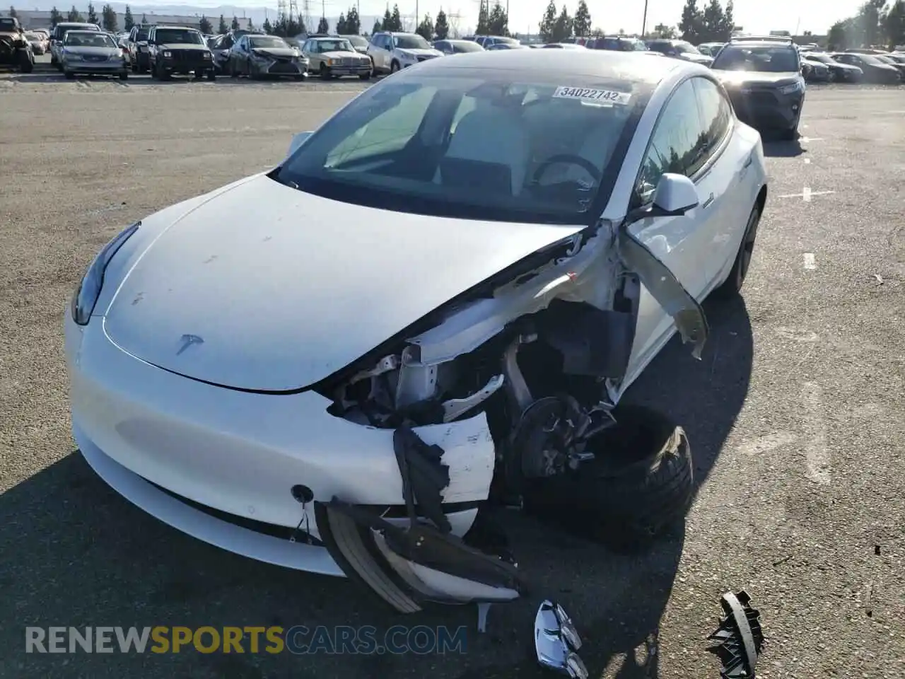 2 Photograph of a damaged car 5YJ3E1EB2MF013306 TESLA MODEL 3 2021