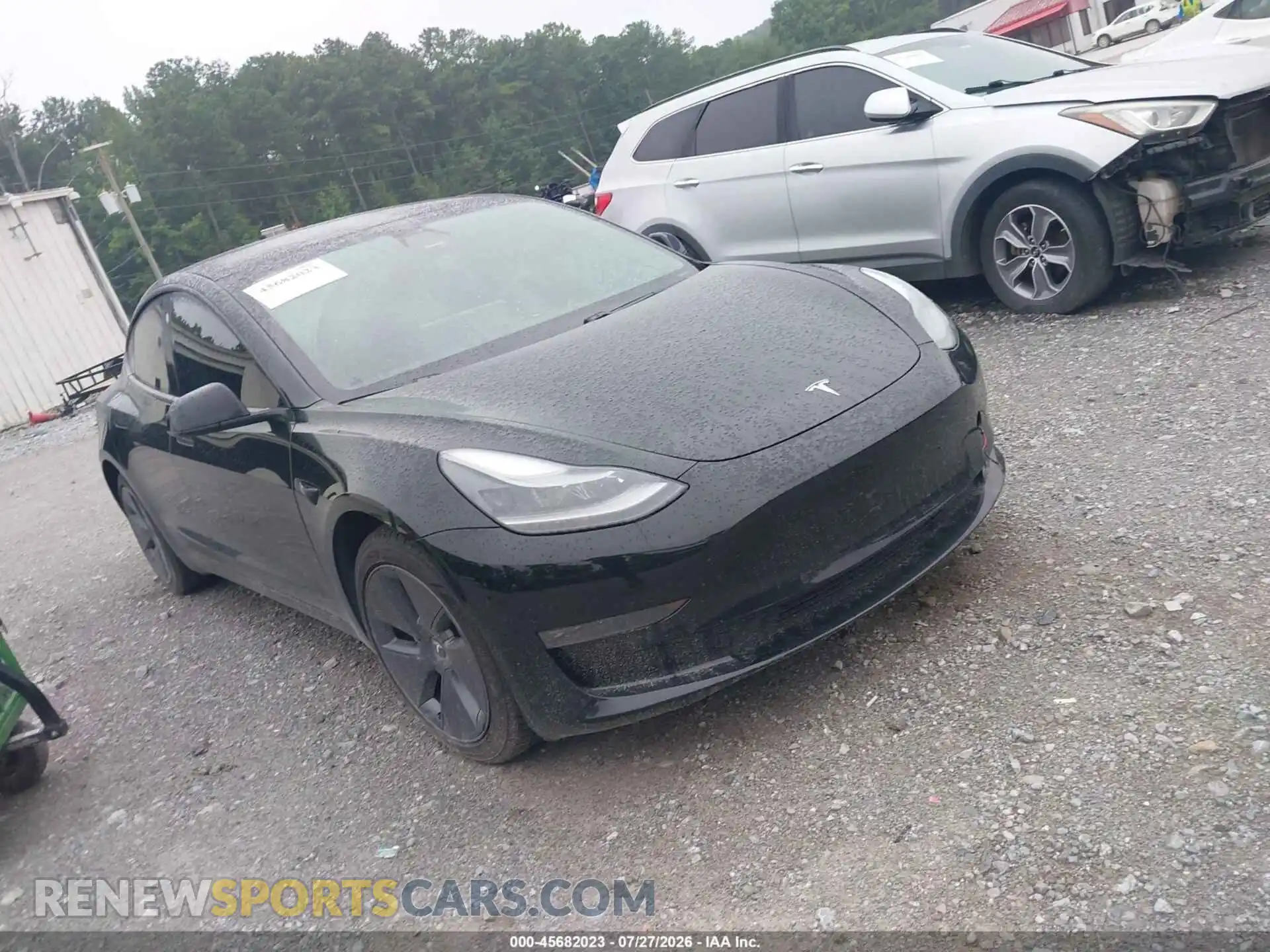 1 Photograph of a damaged car 5YJ3E1EB2MF049562 TESLA MODEL 3 2021