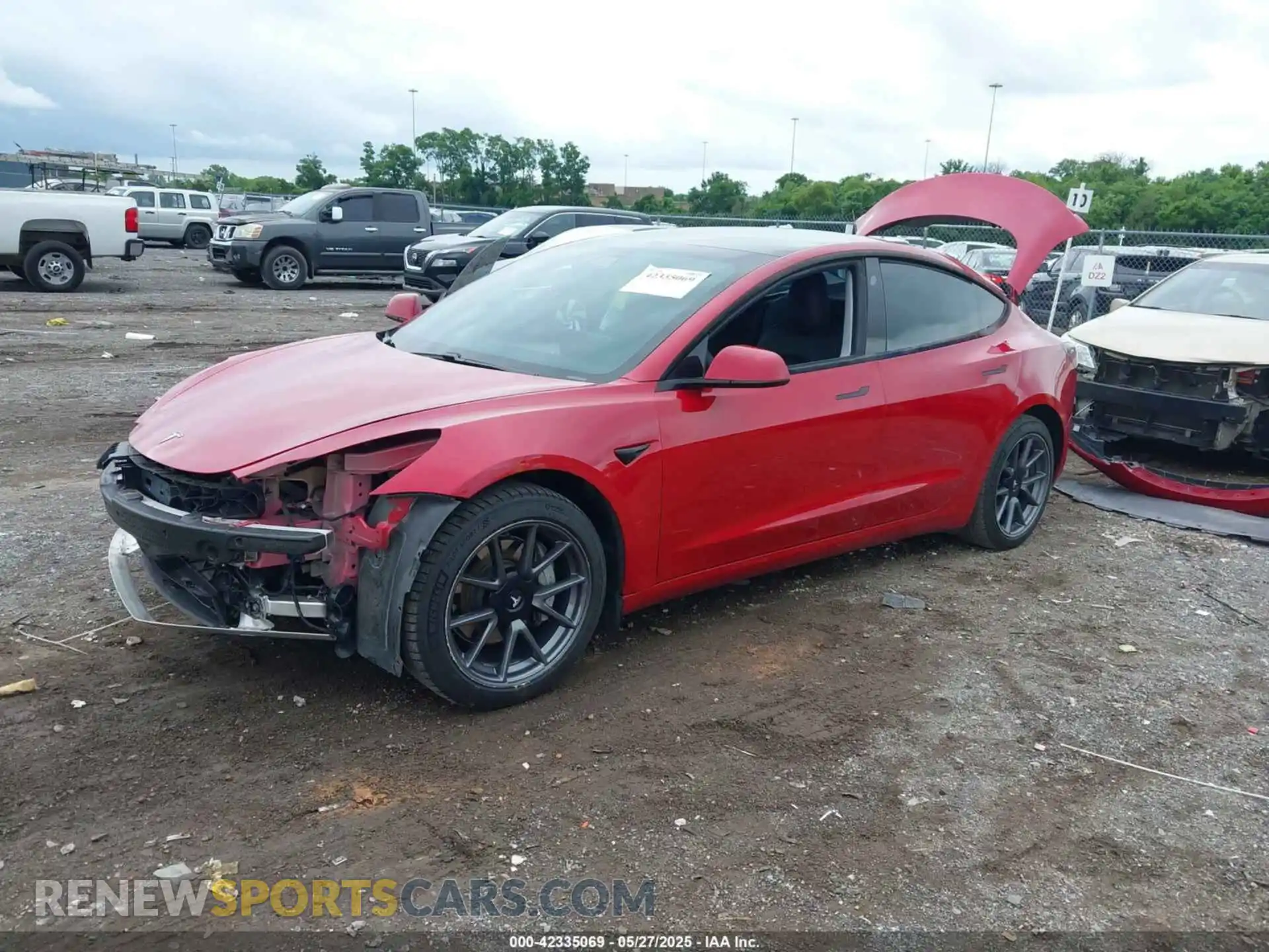 2 fotografías del automóvil dañado 5YJ3E1EB2MF061663 TESLA MODEL 3 2021