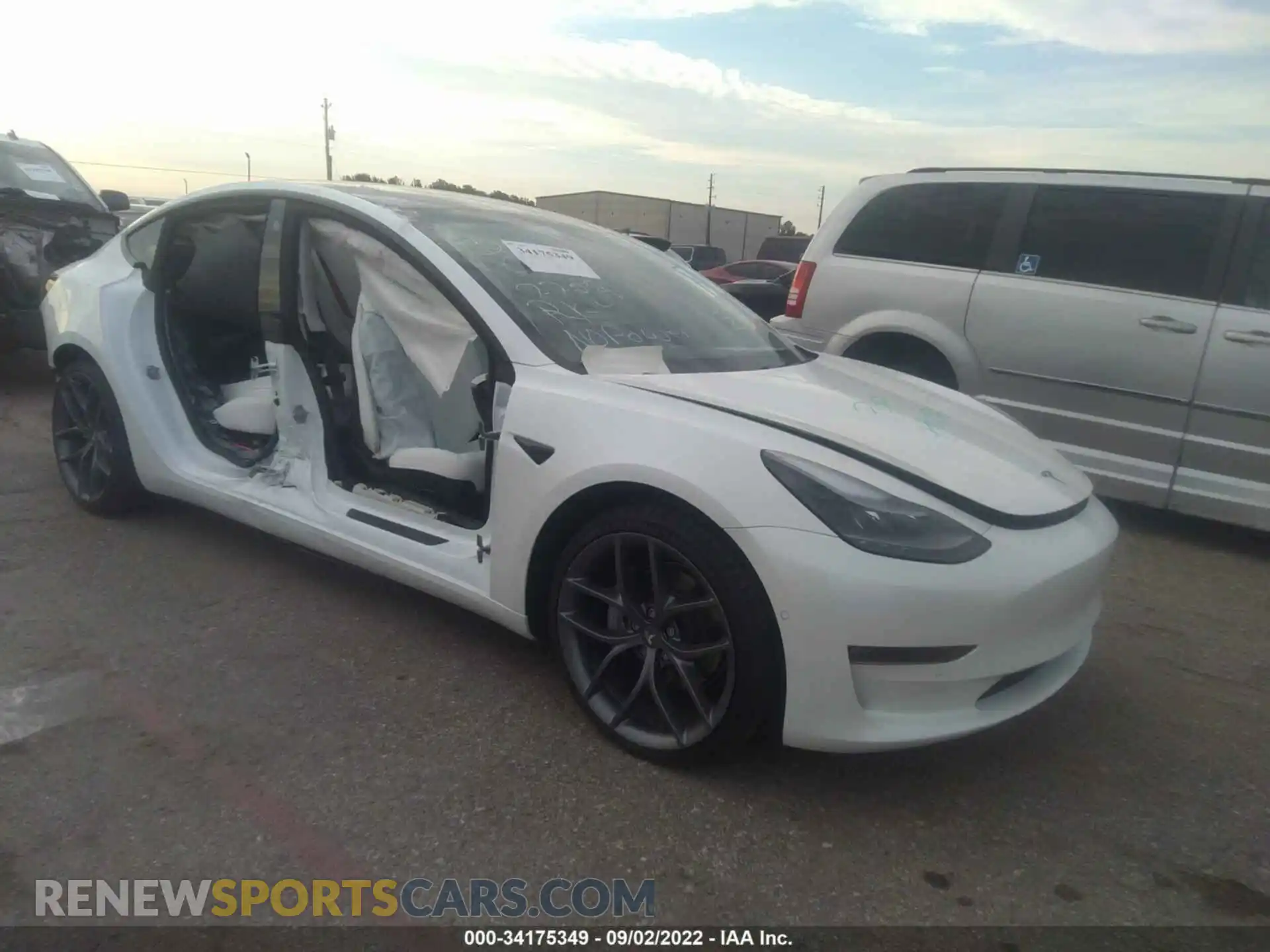 1 Photograph of a damaged car 5YJ3E1EB2MF062702 TESLA MODEL 3 2021