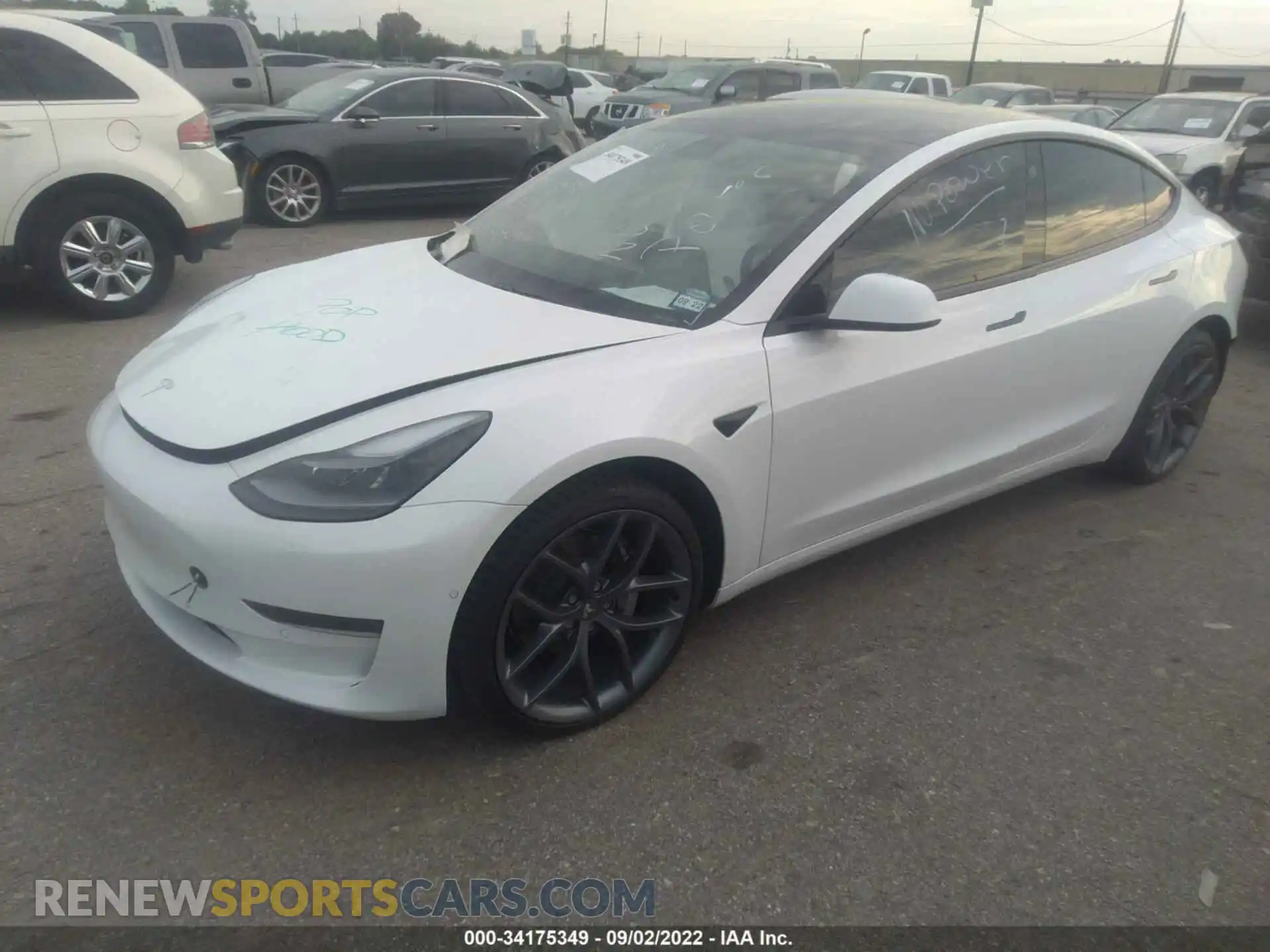 2 Photograph of a damaged car 5YJ3E1EB2MF062702 TESLA MODEL 3 2021