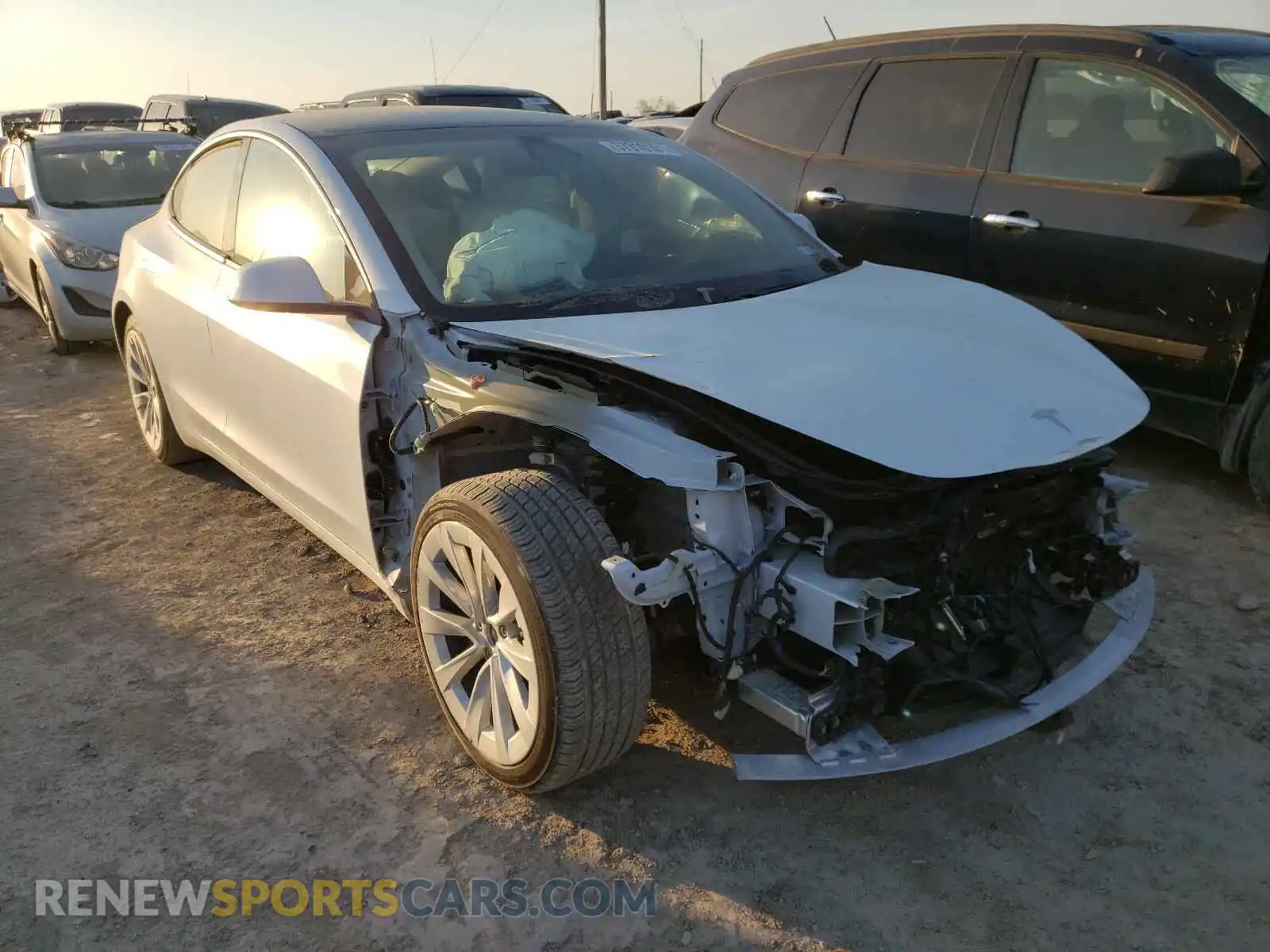 1 Photograph of a damaged car 5YJ3E1EB2MF849973 TESLA MODEL 3 2021