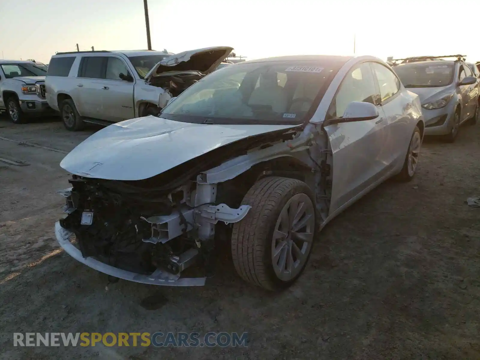 2 Photograph of a damaged car 5YJ3E1EB2MF849973 TESLA MODEL 3 2021