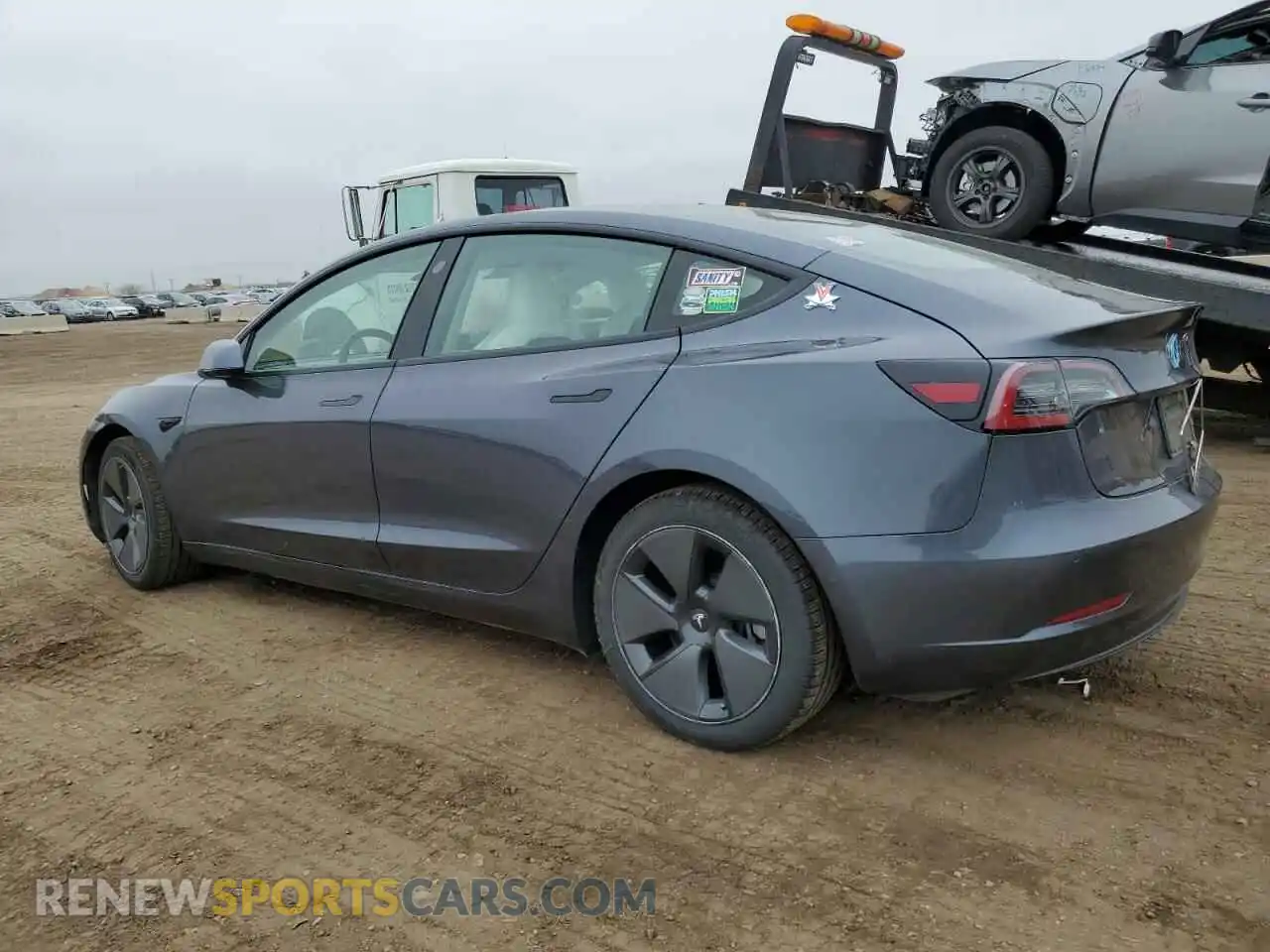2 Photograph of a damaged car 5YJ3E1EB2MF852663 TESLA MODEL 3 2021