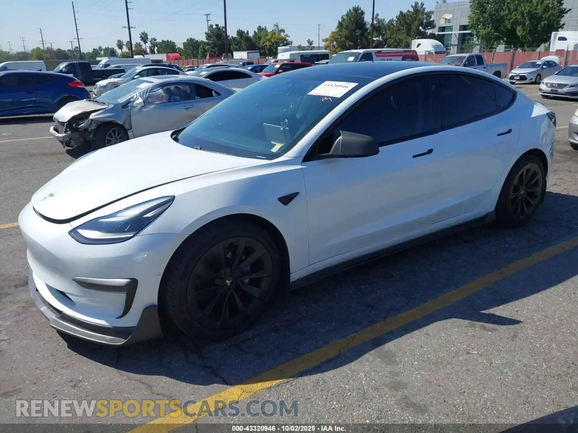 2 Photograph of a damaged car 5YJ3E1EB2MF925790 TESLA MODEL 3 2021