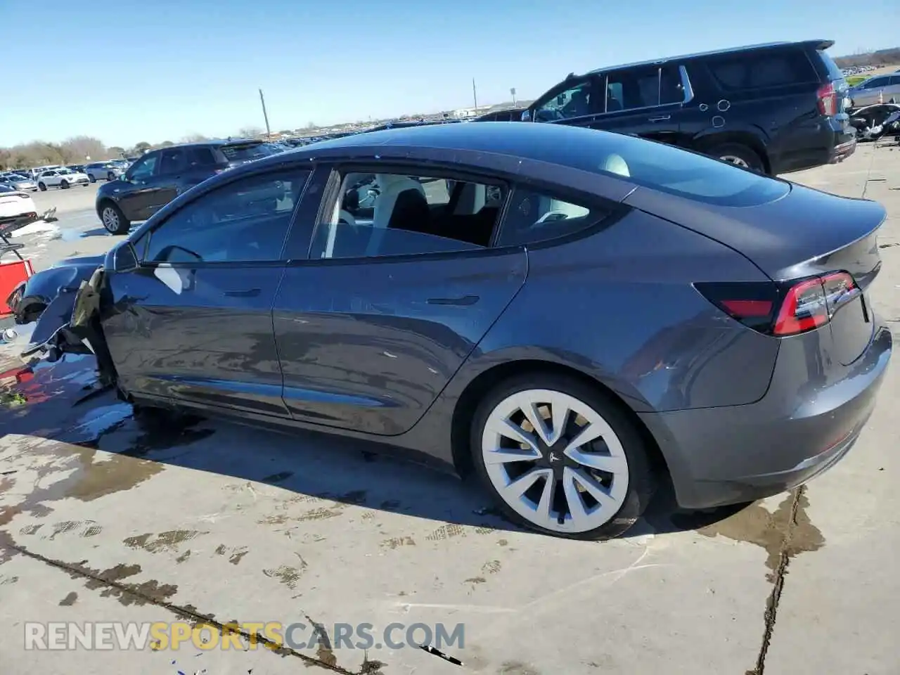 2 Photograph of a damaged car 5YJ3E1EB2MF980711 TESLA MODEL 3 2021