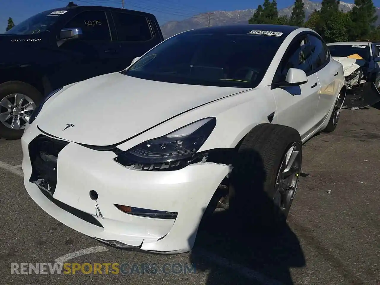 2 Photograph of a damaged car 5YJ3E1EB3MF006896 TESLA MODEL 3 2021