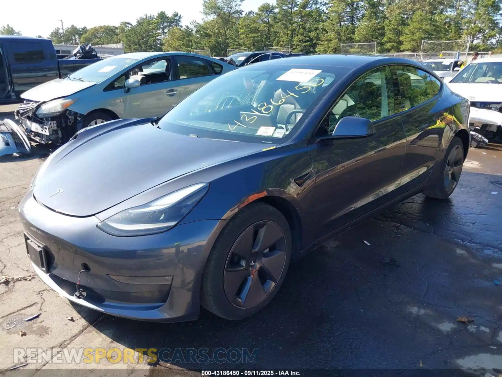 2 Photograph of a damaged car 5YJ3E1EB3MF055225 TESLA MODEL 3 2021