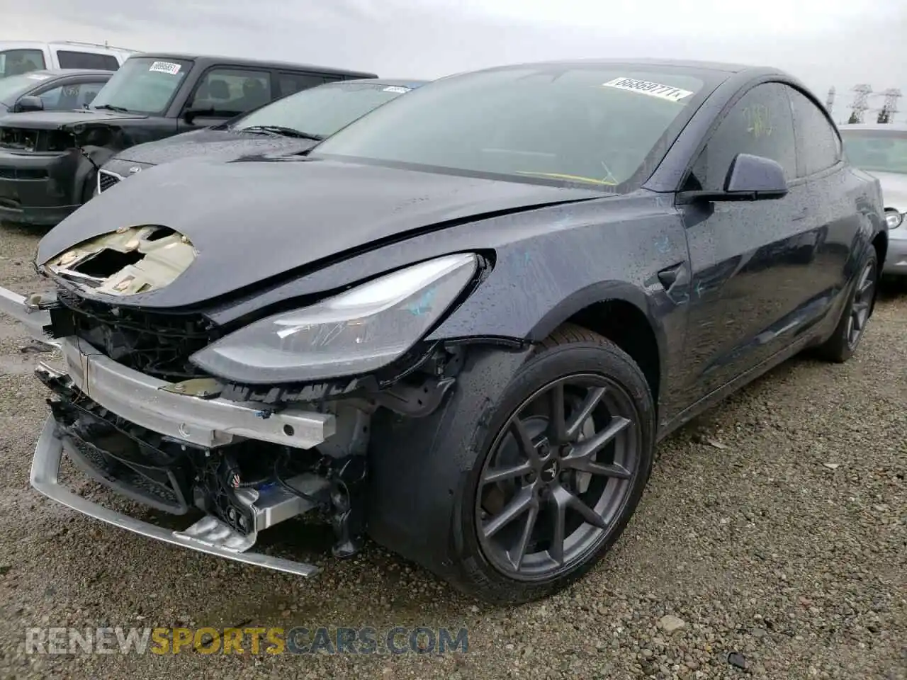2 Photograph of a damaged car 5YJ3E1EB3MF072297 TESLA MODEL 3 2021