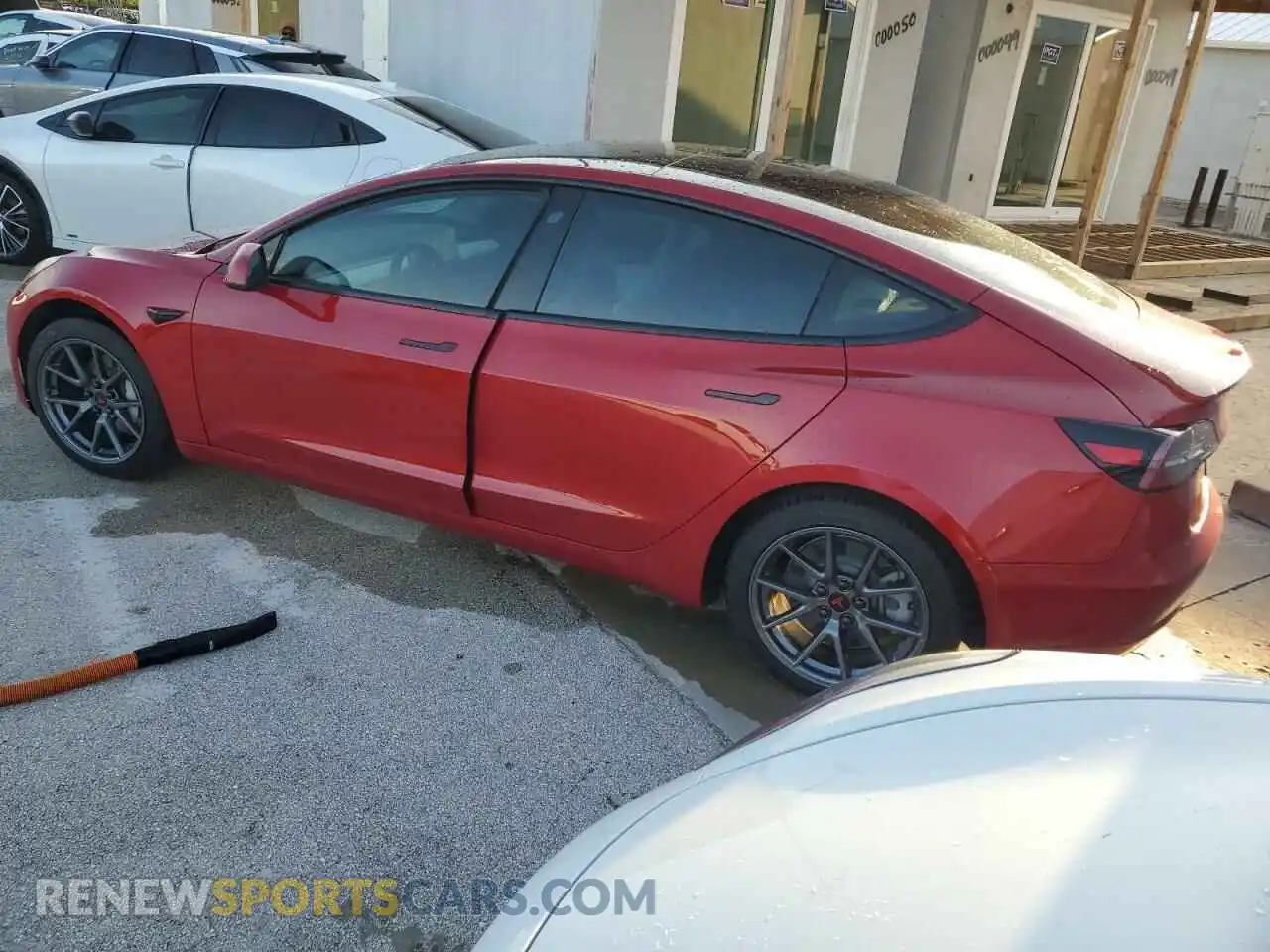 2 Photograph of a damaged car 5YJ3E1EB3MF836956 TESLA MODEL 3 2021