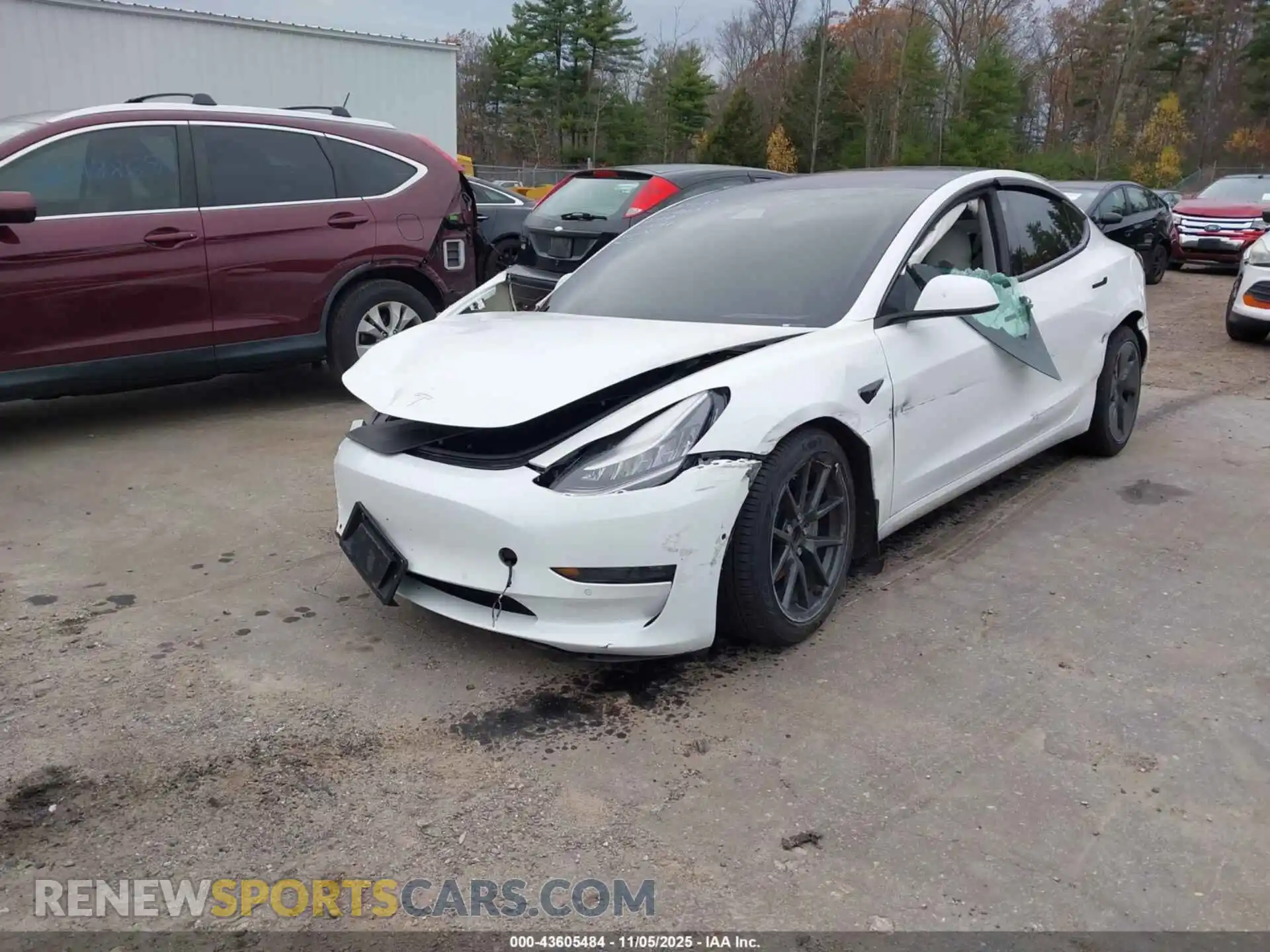 2 Photograph of a damaged car 5YJ3E1EB3MF849447 TESLA MODEL 3 2021