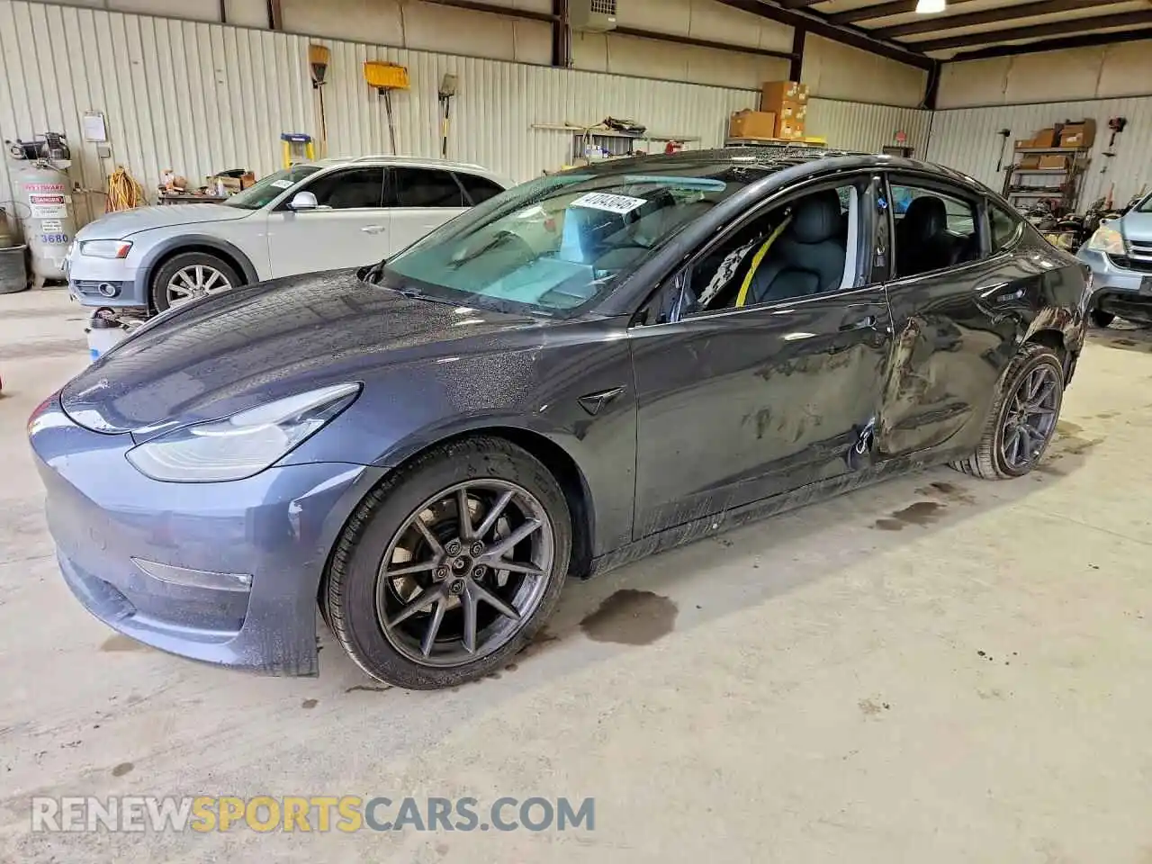 1 Photograph of a damaged car 5YJ3E1EB3MF852719 TESLA MODEL 3 2021