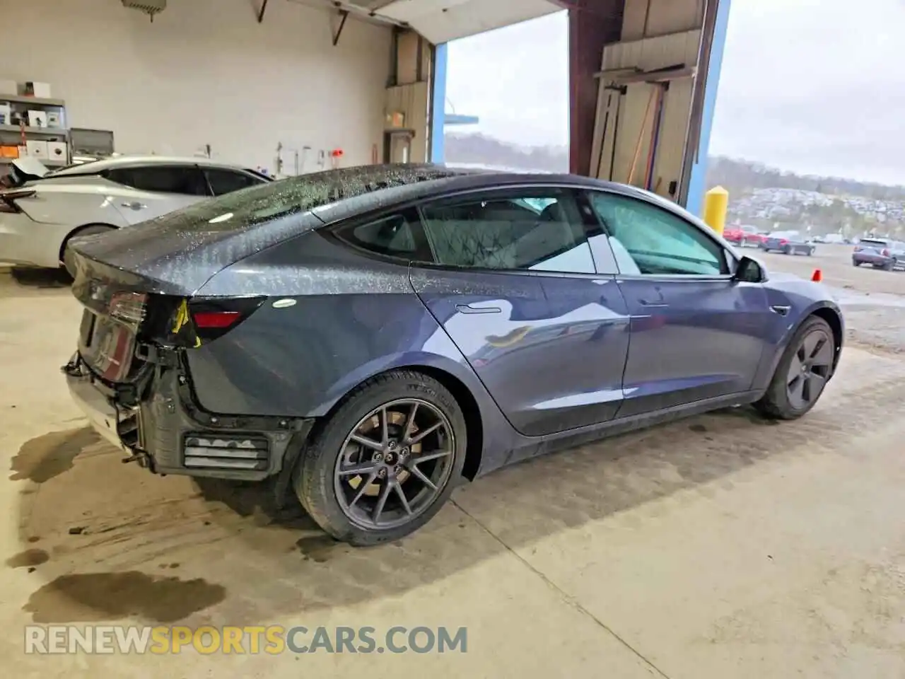3 Photograph of a damaged car 5YJ3E1EB3MF852719 TESLA MODEL 3 2021