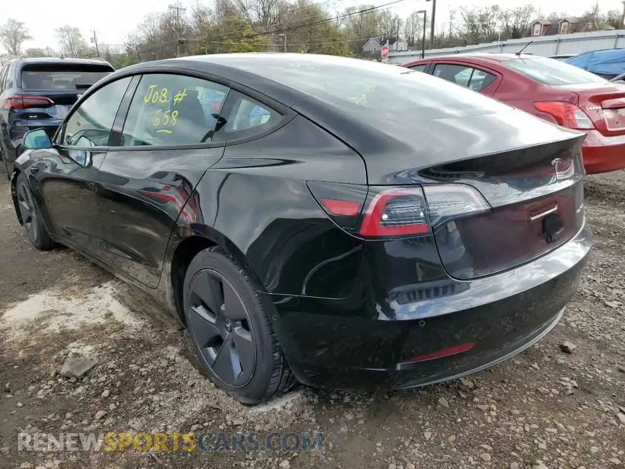2 Photograph of a damaged car 5YJ3E1EB3MF924647 TESLA MODEL 3 2021