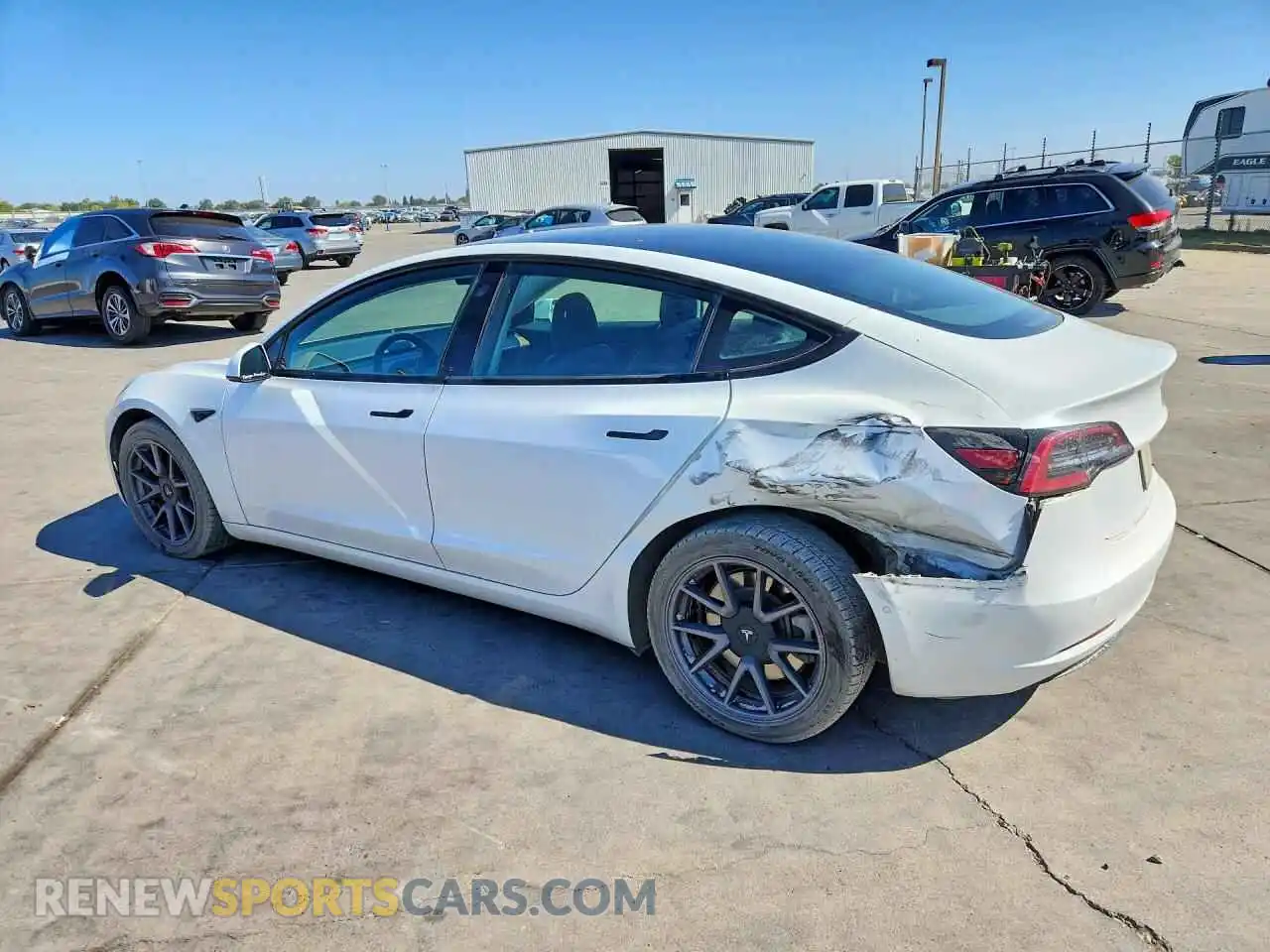 2 Photograph of a damaged car 5YJ3E1EB3MF938094 TESLA MODEL 3 2021