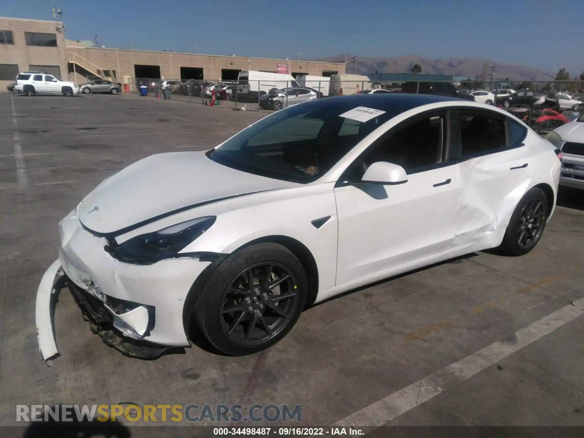 2 Photograph of a damaged car 5YJ3E1EB4MF036327 TESLA MODEL 3 2021