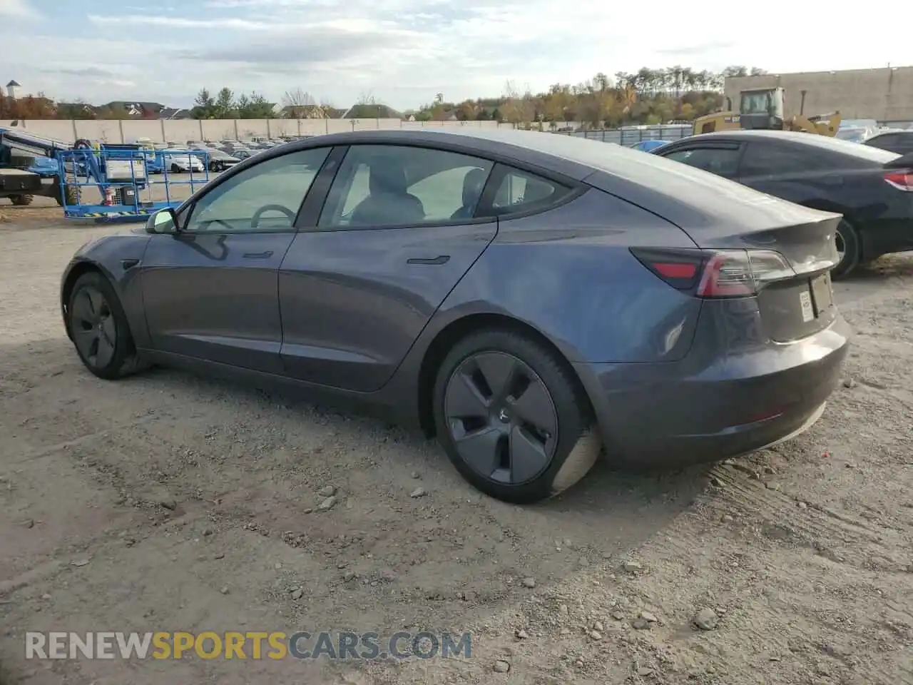 2 Photograph of a damaged car 5YJ3E1EB4MF869335 TESLA MODEL 3 2021