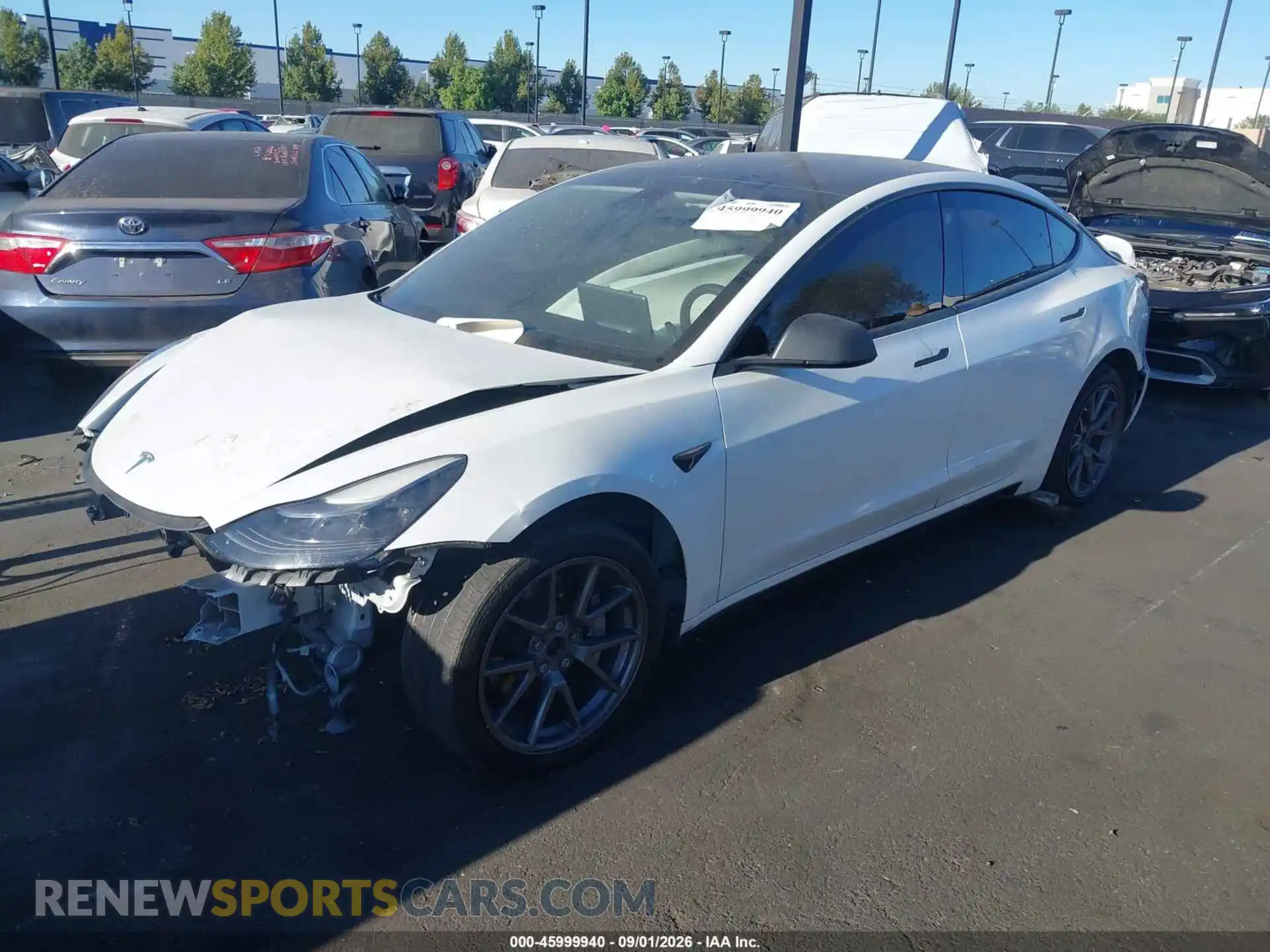 2 Photograph of a damaged car 5YJ3E1EB4MF879010 TESLA MODEL 3 2021
