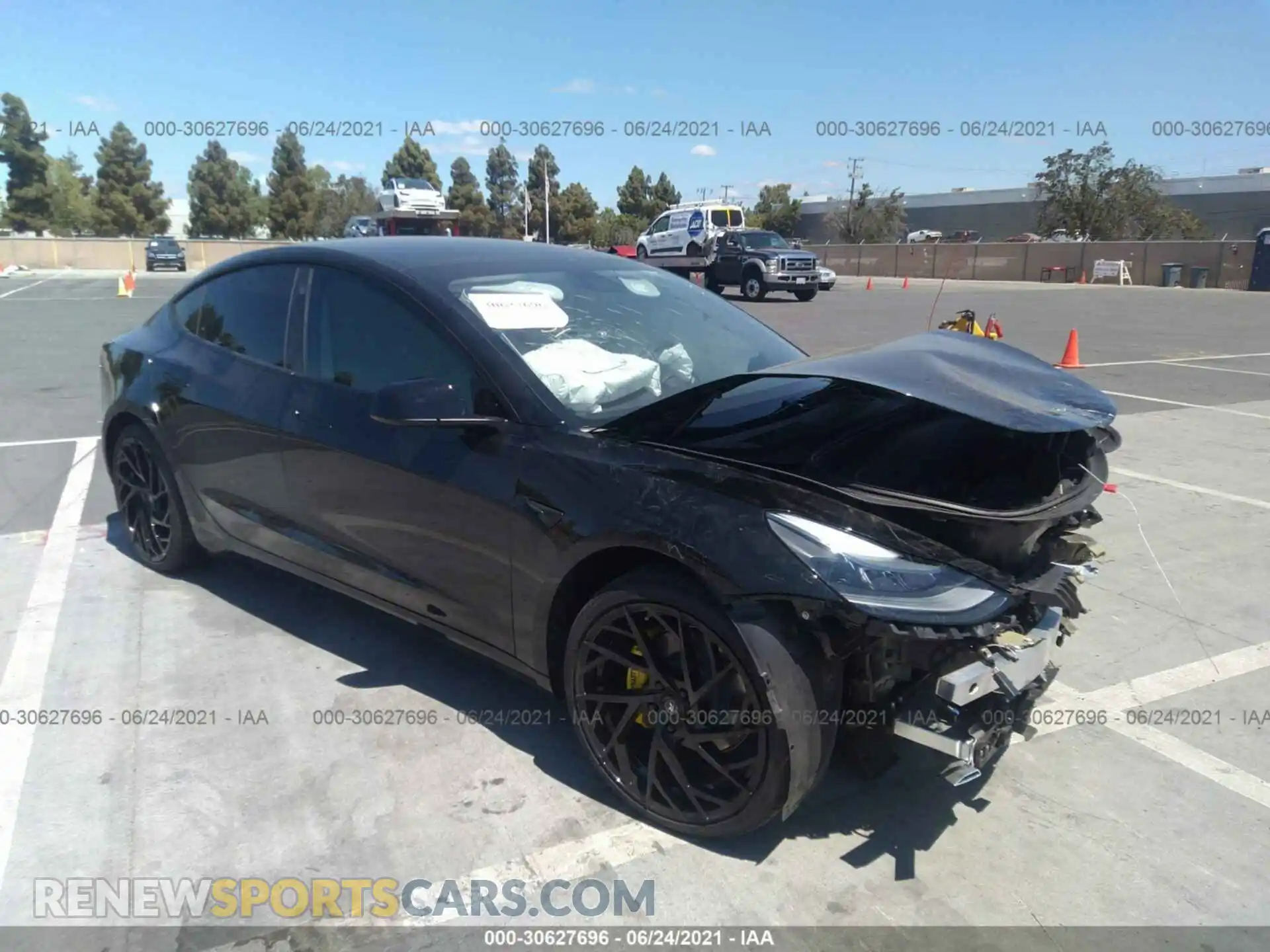 1 Photograph of a damaged car 5YJ3E1EB4MF935995 TESLA MODEL 3 2021