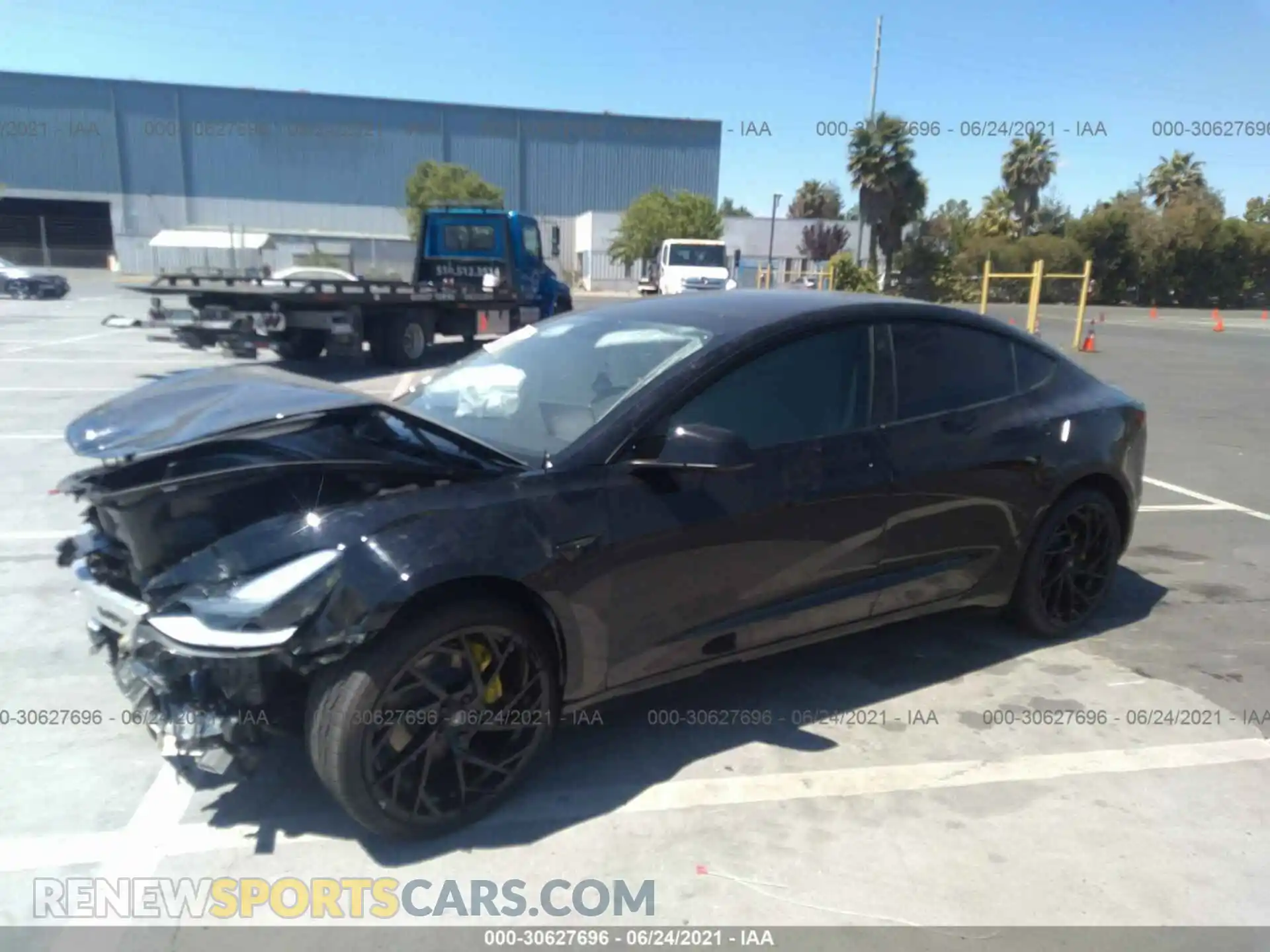 2 Photograph of a damaged car 5YJ3E1EB4MF935995 TESLA MODEL 3 2021
