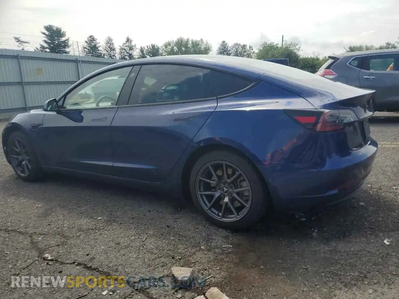 2 Photograph of a damaged car 5YJ3E1EB4MF960962 TESLA MODEL 3 2021